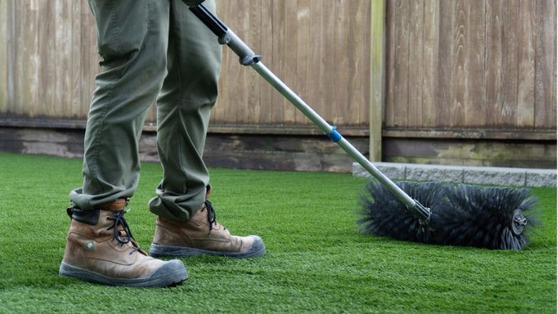 artificial grass power brooming